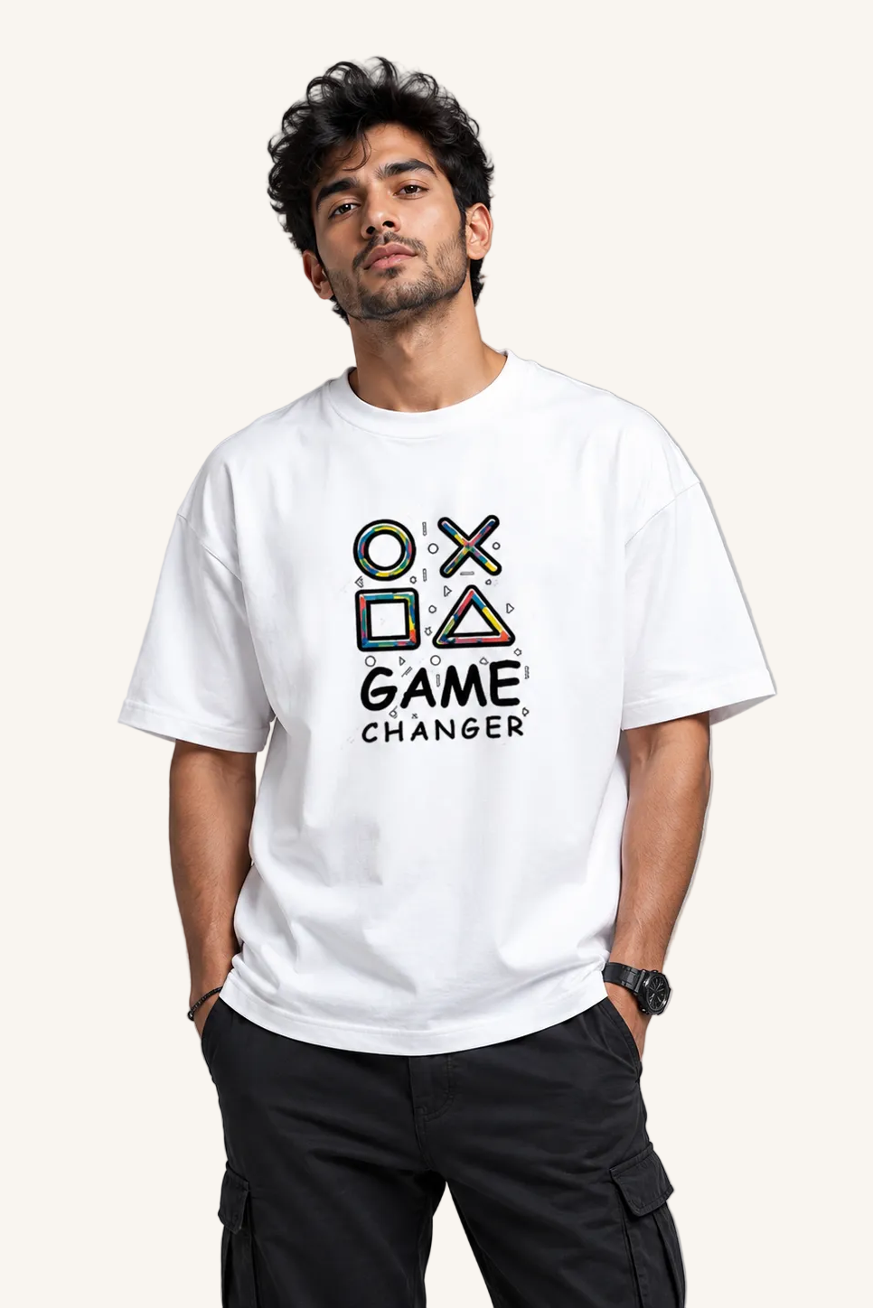 Man wearing a white t-shirt with colorful graphics and text on a gray background