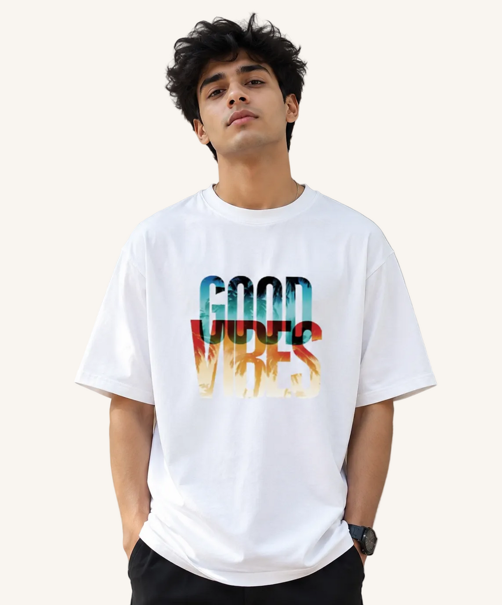 Model wearing Good Vibes oversized dusty rose graphic t-shirt by VibeVastr front view