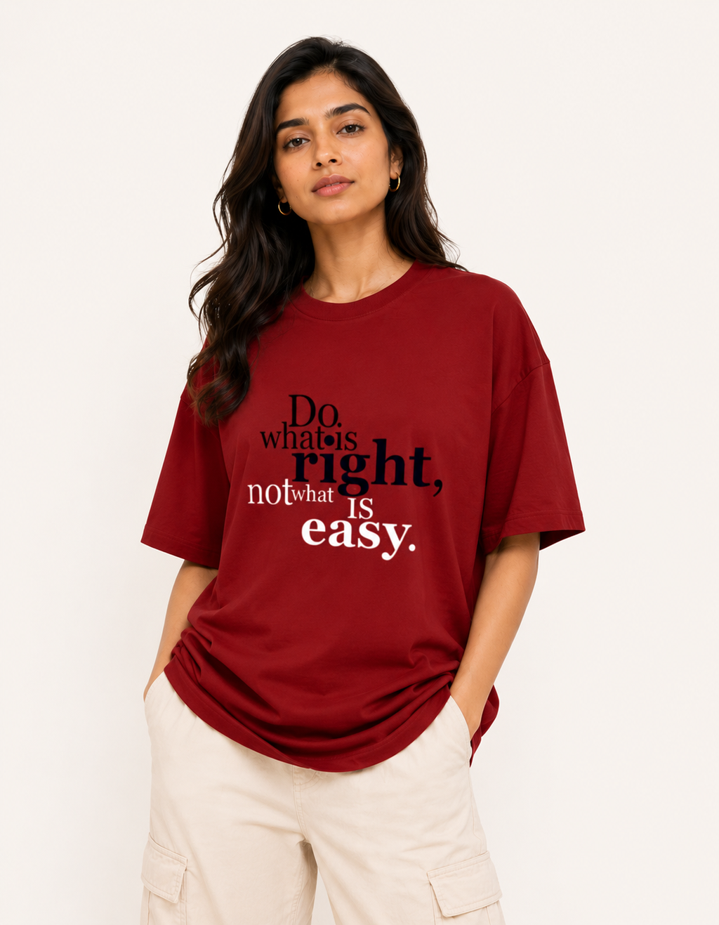 Woman wearing a red t-shirt with a motivational quote on a white background