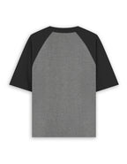 VibeVastr Unisex Oversized Raglan T-Shirt in premium cotton with a relaxed oversized fit for men and women.
