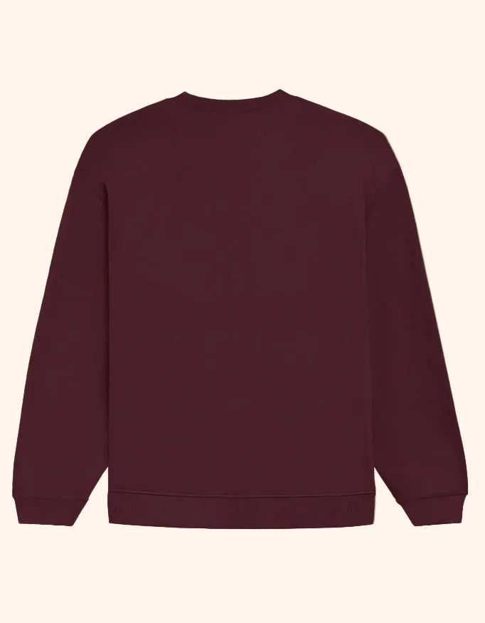 Maroon sweatshirt on a gray background