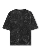 A black short-sleeve t-shirt with a white marble or distressed stone pattern, shown from the back on a solid white background.