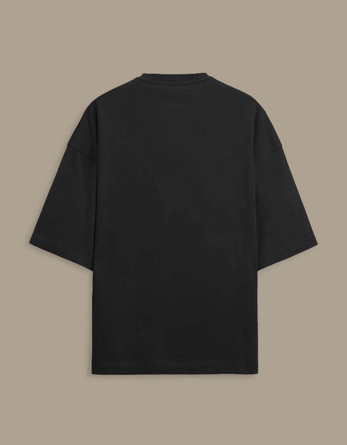 black t-shirt on a gray background