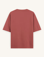 Coral t-shirt on a white background