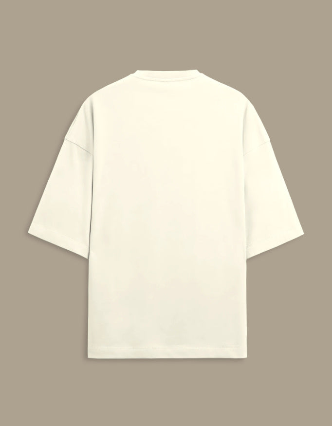 An off-white t-shirt on a beige background