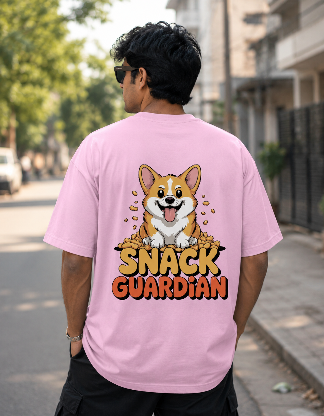 A baby pink oversized 260 GSM Terry T-shirt featuring a cute Corgi with a "Snack Guardian" graphic print, premium unisex streetwear by VibeVastr.