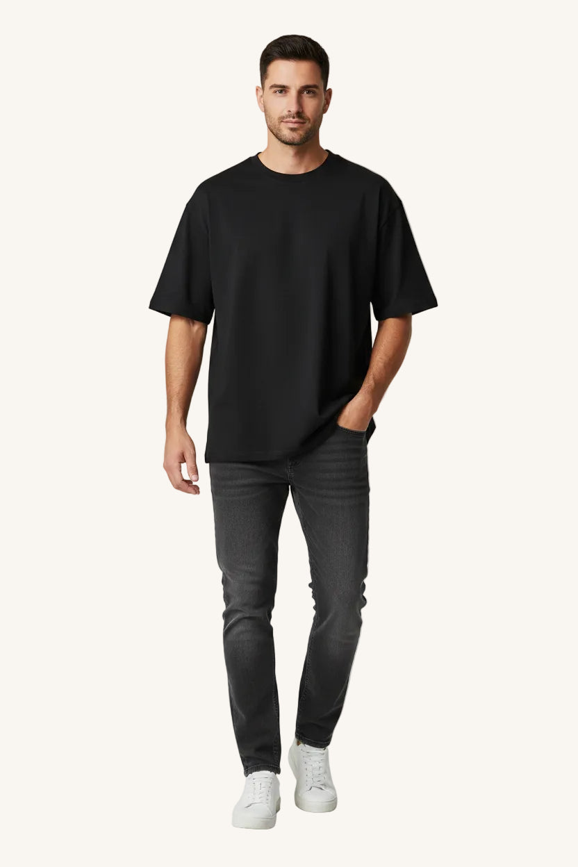Black t-shirt with an orange logo on a white background