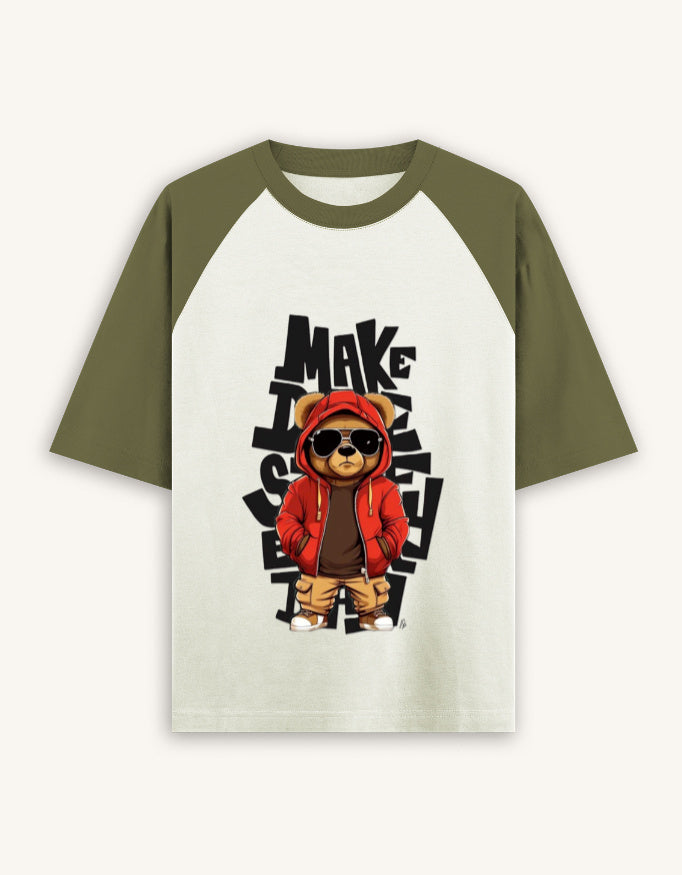 T-shirt with a bear graphic and text on a white background