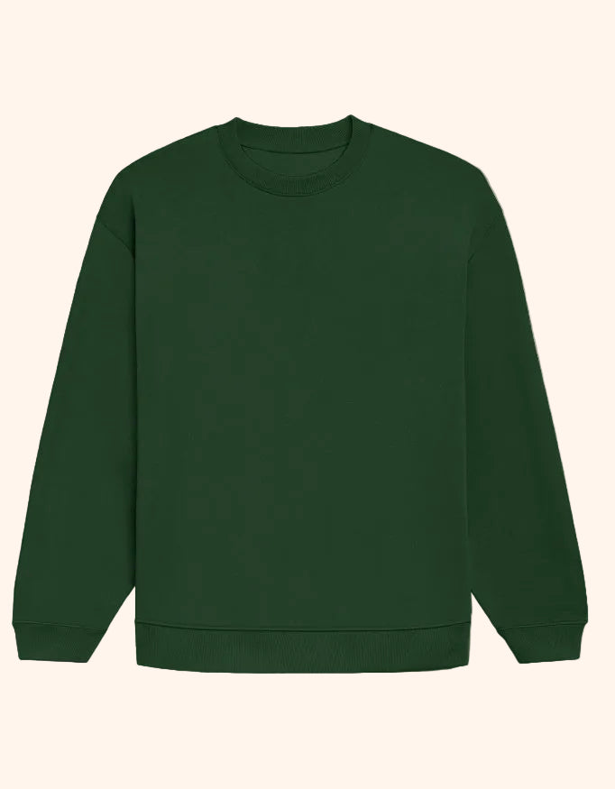 A dark forest green crewneck sweatshirt with long sleeves and ribbed cuffs and hem, displayed flat against a solid taupe background.