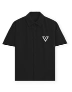 Black shirt with a graphic design on the chest against a white background
