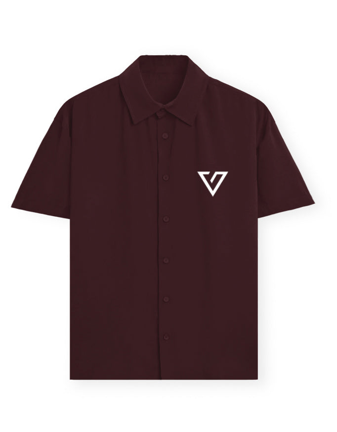 Maroon shirt with a graphic design on the chest against a white background