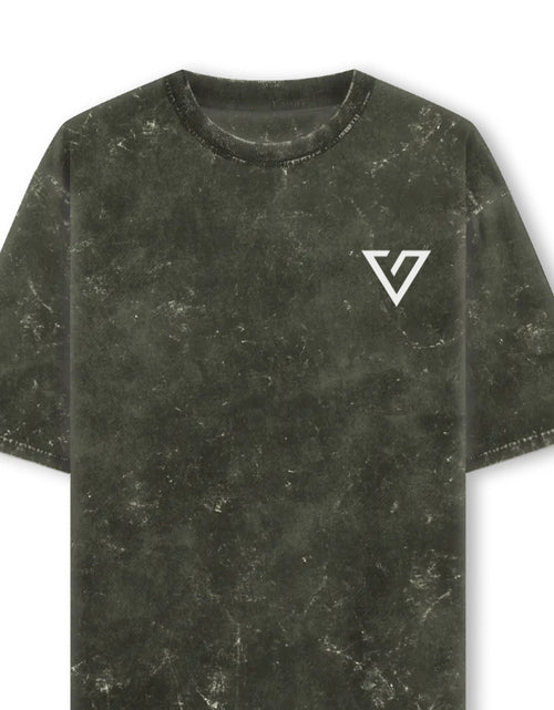 A short-sleeve crewneck t-shirt in a dark olive green mineral-wash or distressed texture, featuring a white stylized 'V' logo on the left chest, shown against a plain white background.