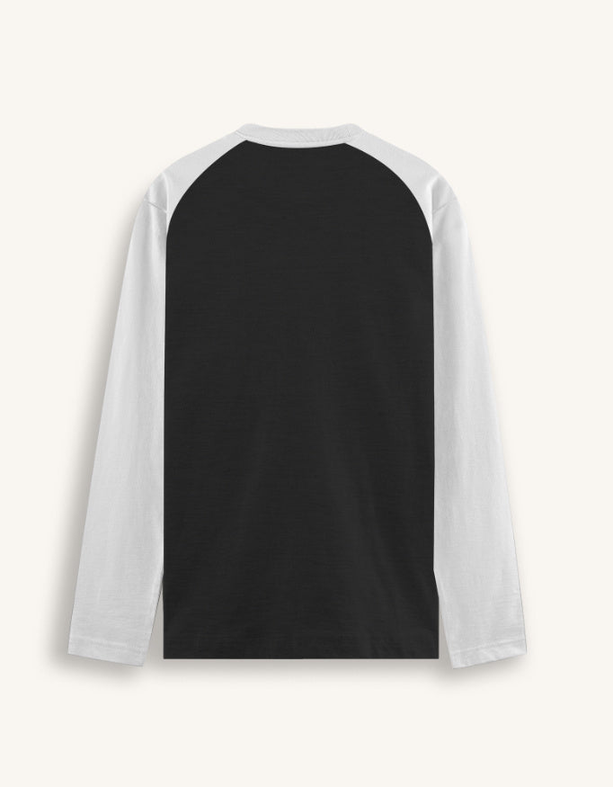 Black and white long-sleeve shirt on a light gray background
